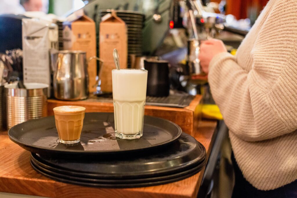 close up tea cup table cafe min